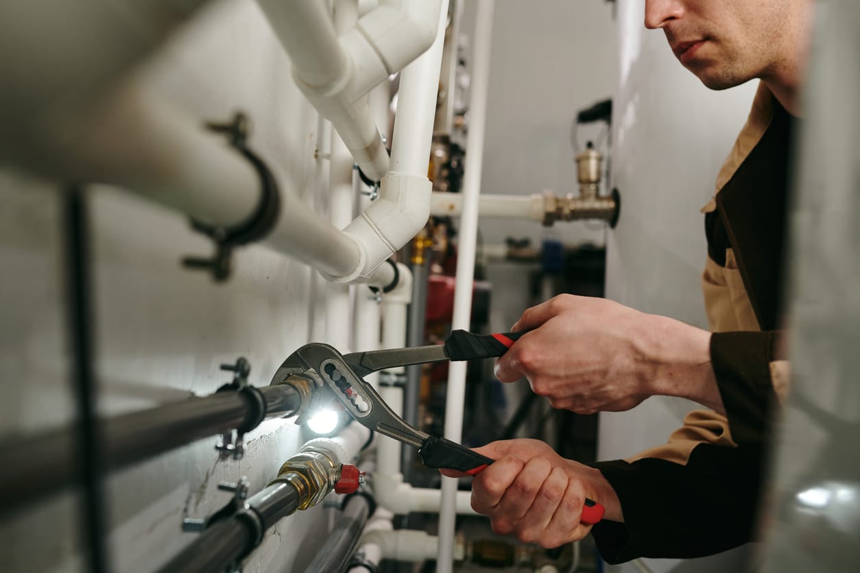 Plumbers maintaining commercial plumbing pipes in Margate