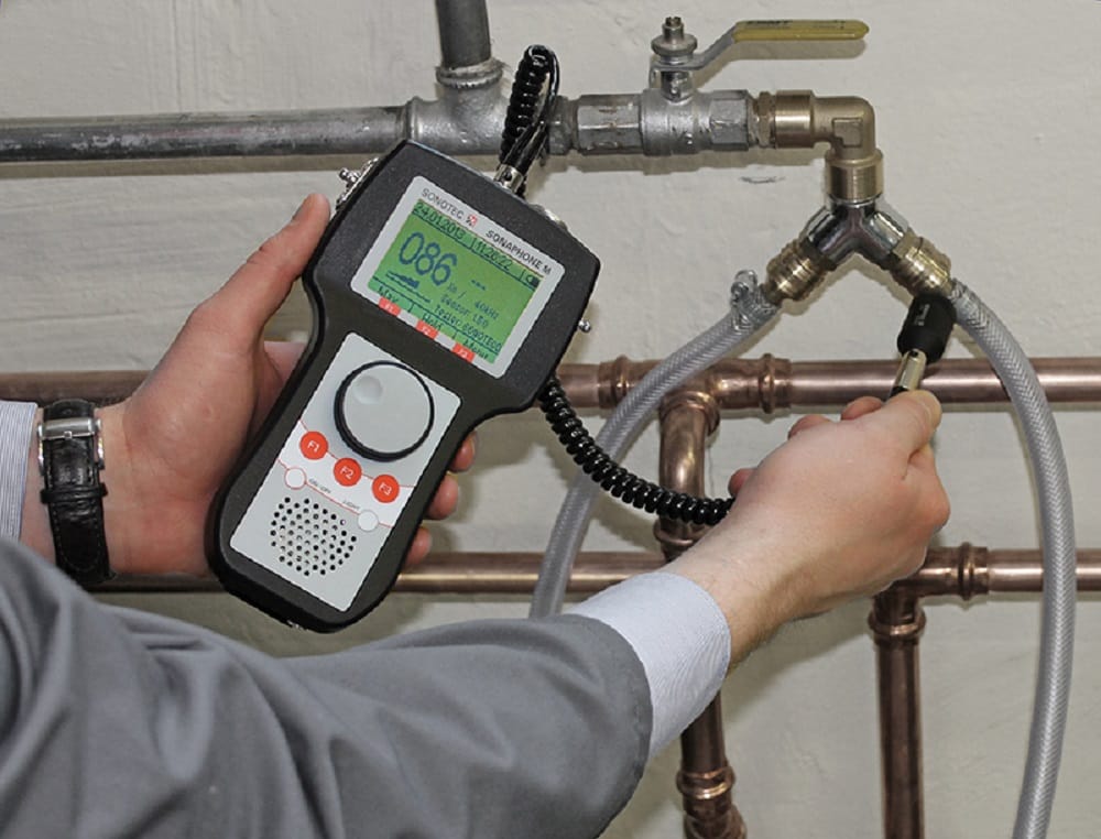 Plumber testing pipes with electronic leak detection equipment in Margate